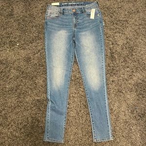 Super skinny light wash mid-rise jeans